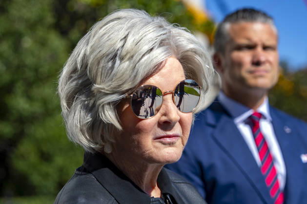 White House Chief of Staff Susie Wiles look on as United States President Donald J Trump speaks with reporters before boarding Marine One on the South Lawn of the White House in Washington, DC on Tuesday, October 6, 2026. The President is going to Baltimore, Maryland to deliver remarks at Anduril Industries, a tech company that builds robotic weapons and software for the military. Copyright: xBonniexCashx xPoolxviaxCNPx MediaPunchx