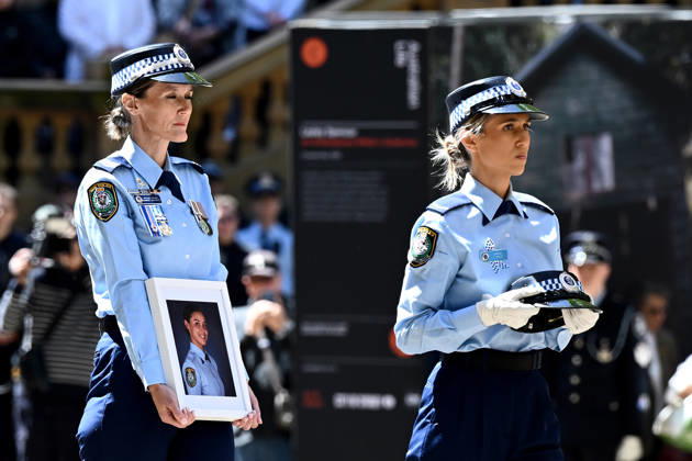 MIA LAY FUNERAL, NSW Police officers carry the hat and a portrait of Mia Lay, during the funeral service for NSW Police Constable Mia Lay at St Andrew s Cathedral, in Sydney, Wednesday, October 7, 2026. Constable Mia Lay, 20, died when the marked vehicle she was a passenger in crashed into a tree early on September 25 in the Sydney suburb of Redfern. ( NO ARCHIVING SYDNEY NEW SOUTH WALES Australia  Copyright: xDANxHIMBRECHTSx 20261007120076997726