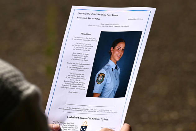 MIA LAY FUNERAL, A mourner holds the order of service during the funeral service for NSW Police Constable Mia Lay at St Andrew s Cathedral, in Sydney, Wednesday, October 7, 2026. Constable Mia Lay, 20, died when the marked vehicle she was a passenger in crashed into a tree early on September 25 in the Sydney suburb of Redfern. ( NO ARCHIVING SYDNEY NEW SOUTH WALES Australia  Copyright: xDANxHIMBRECHTSx 20261007125695789786