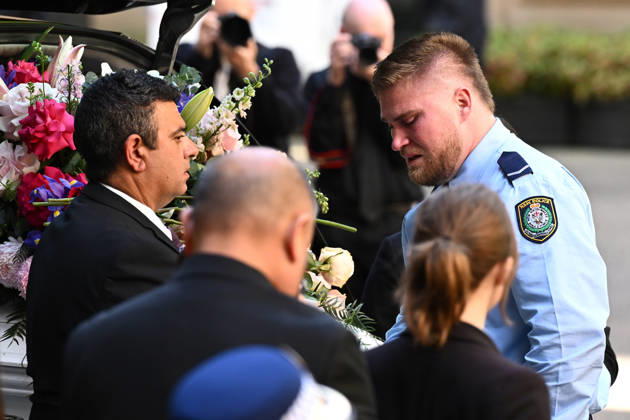 MIA LAY FUNERAL, Daniel Vasquez the partner of Mia Lay places a rose on her casket following the funeral service for NSW Police Constable Mia Lay at St Andrew s Cathedral, in Sydney, Wednesday, October 7, 2026. Constable Mia Lay, 20, died when the marked vehicle she was a passenger in crashed into a tree early on September 25 in the Sydney suburb of Redfern. ( NO ARCHIVING SYDNEY NEW SOUTH WALES Australia  Copyright: xDANxHIMBRECHTSx 20261007111592824630