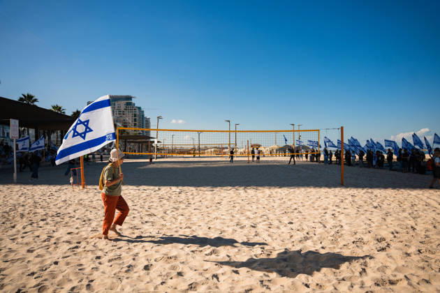 October 7, 2026, Tel Aviv, Tel Aviv, Israel: Activists carry flags at the beach in protest against the Israeli government on the third anniversary of October 7th. Tel Aviv Israel  - ZUMAg280 20261007_znp_g280_006 Copyright: xYoavxGinsburgx