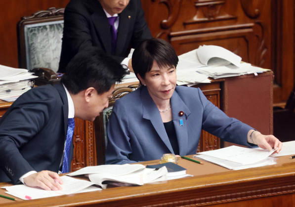 October 7, 2026, Tokyo, Japan - Japanese Prime Minister Sanae Takaichi (R) listens to Chief Cabinet Secretary Minoru Kihara (L) at Lower House s plenary session at the National Diet in Tokyo on Wednesday, October 7, 2026. (photo by Yoshio Tsunoda AFLO)  aflo_354016951