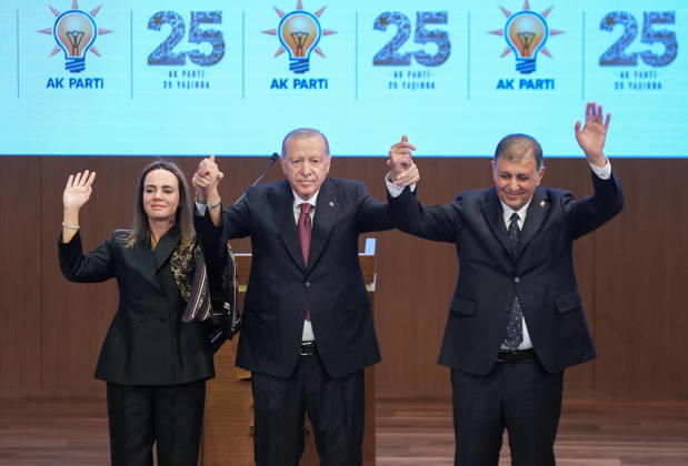 Legislative Year Opening Meeting with AK Party Deputies in Ankara ANKARA, TURKIYE - OCTOBER 07: Turkish President and Justice and Development (AK) Party Chairman Recep Tayyip Erdogan (C) poses for a photo after pinning a party badge on Izmir Metropolitan Municipality Mayor Cemil Tugay (R), who joined the AK Party, during the Legislative Year Opening Meeting with AK Party MPs at the AK Party Congress Center in Ankara, Turkiye on October 07, 2026. Ercin Erturk Anadolu Ankara Turkey. Editorial use only. Please get in touch for any other usage.  Copyright: x2026xAnadoluxErcinxErturkx