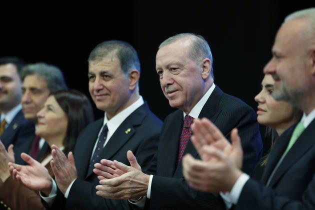 Turkish President and Leader of the Justice and Development (AK) Party Recep Tayyip Erdogan ANKARA, TURKIYE - OCTOBER 7: (----EDITORIAL USE ONLY - MANDATORY CREDIT - TURKISH PRESIDENCY MUSTAFA KAMACI HANDOUT - NO MARKETING NO ADVERTISING CAMPAIGNS - DISTRIBUTED AS A SERVICE TO CLIENTS----) Turkish President and Leader of the Justice and Development (AK) Party Recep Tayyip Erdogan (C) attends the Legislative Year Opening Meeting with AK Party Deputies at the AK Party Congress Center in Ankara, Turkiye on October 7, 2026. Erdogan pinned a party badge on Cemil Tugay, the mayor of Izmir Metropolitan Municipality, who joined the AK Party. TUR Presidency Mustafa Kamaci Handout Anadolu Ankara Turkey. Editorial use only. Please get in t  Copyright: x2026xAnadoluxTURxPresidencyx xMustafaxKamacix xHandoutx