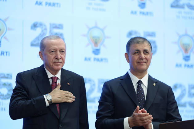 Turkish President and Leader of the Justice and Development (AK) Party Recep Tayyip Erdogan ANKARA, TURKIYE - OCTOBER 7: (----EDITORIAL USE ONLY - MANDATORY CREDIT - TURKISH PRESIDENCY MUSTAFA KAMACI HANDOUT - NO MARKETING NO ADVERTISING CAMPAIGNS - DISTRIBUTED AS A SERVICE TO CLIENTS----) Turkish President and Leader of the Justice and Development (AK) Party Recep Tayyip Erdogan (L) attends the Legislative Year Opening Meeting with AK Party Deputies at the AK Party Congress Center in Ankara, Turkiye on October 7, 2026. Erdogan pinned a party badge on Cemil Tugay (R), the mayor of Izmir Metropolitan Municipality, who joined the AK Party. TUR Presidency Mustafa Kamaci Handout Anadolu Ankara Turkey. Editorial use only. Please get  Copyright: x2026xAnadoluxTURxPresidencyx xMustafaxKamacix xHandoutx