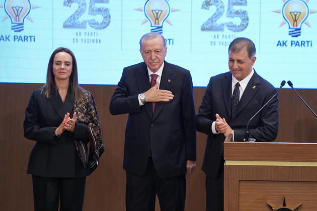 Turkish President and Leader of the Justice and Development (AK) Party Recep Tayyip Erdogan ANKARA, TURKIYE - OCTOBER 7: Turkish President and Leader of the Justice and Development (AK) Party Recep Tayyip Erdogan (C) pins an AK Party badge on Izmir Metropolitan Municipality Mayor Cemil Tugay (R), who joined the party, during the Legislative Year Opening Meeting with AK Party lawmakers at the AK Party Congress Center in Ankara, Turkiye, on October 07, 2026. Ercin Erturk Anadolu Ankara Turkey. Editorial use only. Please get in touch for any other usage.  Copyright: x2026xAnadoluxErcinxErturkx