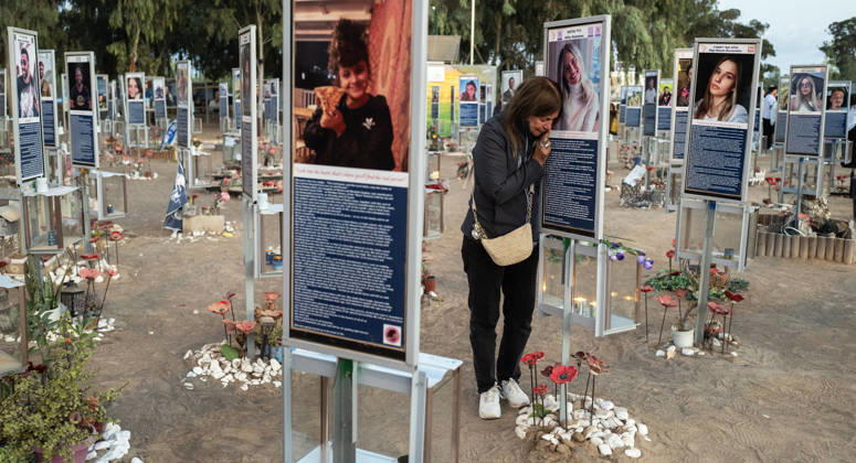 Israelis mourn at sunrise in the Re im memorial on the third anniversary where Hamas massacred 364 people and took another 40 hostages during the Nova dance party on October 7, 2023, near Kibbutz Re im, southern Israel on Wednesday, October 7, 2026. The Hamas cross-border attacks resulted in the deaths of approximately 1,200 people and the abduction of 251 hostages.  ISR20260608002827 JimxHollander