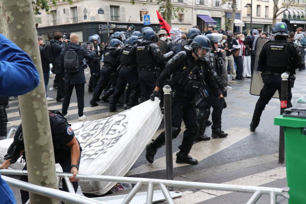 Student blockade near Sciences Po Paris PARIS, FRANCE - OCTOBER 7: A heavy police presence is deployed at the scene as students denounce conditions in the education system and express solidarity with mobilized high school students in Paris, France, on October 7, 2026. Students gather behind makeshift barricades made of trash bins and metal barriers near Sciences Po Paris as part of ongoing mobilization linked to the broader high school and university protest movement. Umit Donmez Anadolu Paris France. Editorial use only. Please get in touch for any other usage.  Copyright: x2026xAnadoluxUmitxDonmezx