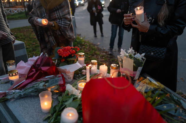 October 7, 2026, Stockholm, Stockholm County, Sweden: STOCKHOLM, SWEDEN - OCTOBER 7, 2026: People gather outside the Israeli Embassy in Stockholm to show support for Israel and remember the victims of the October 7 attacks. Participants place flowers and light candles at a memorial as Israeli and Iranian flags are displayed during the gathering Stockholm Sweden  - ZUMAa136 20261007_zap_a136_004 Copyright: xJoelxLindhex