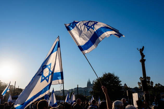 Prague marks three years since start of Israel - Hamas conflict - 07 Oct 2026 People holding israeli flags at Jan Palach Square in Prague during a ceremony honoring the victims of the October 7 2023 attacks in Israel. The attack which was carried out by the Palestinian militant group, Hamas from the Gaza Strip, resulted in the deaths of 1,205 people, most of them civilians. In response, Israel began military campaign on Gaza Strip. Various commemorations are taking place globally to mark the third anniversary of the Hamas attacks in Israel. Prague Czech Republic Copyright: xTomasxTkacikx xSOPAxImagesx 20261007-izrael-vyrocie-002