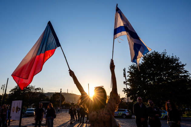 Prague marks three years since start of Israel - Hamas conflict - 07 Oct 2026 Woman holding flags of Israel and Czech Republic seen at Jan Palach Square in Prague during a ceremony honoring the victims of the October 7 2023 attacks in Israel. The attack which was carried out by the Palestinian militant group, Hamas from the Gaza Strip, resulted in the deaths of 1,205 people, most of them civilians. In response, Israel began military campaign on Gaza Strip. Various commemorations are taking place globally to mark the third anniversary of the Hamas attacks in Israel. Prague Czech Republic Copyright: xTomasxTkacikx xSOPAxImagesx 20261007-izrael-vyrocie-004
