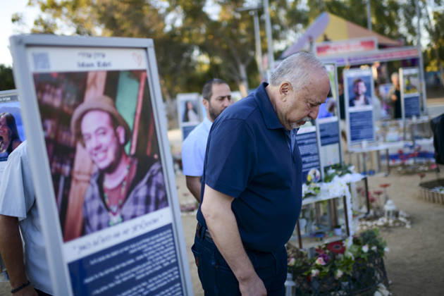 Reim Nova Memorial Marks Anniversary A man in a navy shirt walks past a memorial portrait plaque at the Nova music festival memorial site near Reim, southern Israel, on October 7, 2026. The Hamas-led attack on Israel on October 7, 2023, killed about 1,200 people and saw 251 taken hostage; more than 350 people were killed at the Nova festival. Memorial events marking the third anniversary were held at the site throughout the day. Reim Southern District Israel Copyright: xTomerxNeubergx