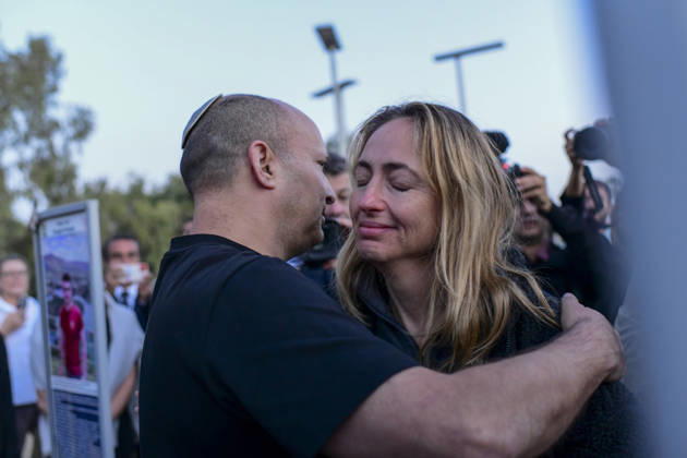 Reim Nova Memorial Marks Anniversary Former Israeli prime minister Naftali Bennett embraces a woman during his visit at the Nova music festival memorial site near Reim, southern Israel, on October 7, 2026. The Hamas-led attack on Israel on October 7, 2023, killed about 1,200 people and saw 251 taken hostage; more than 350 people were killed at the Nova festival. Memorial events marking the third anniversary were held at the site throughout the day. Reim Southern District Israel Copyright: xTomerxNeubergx
