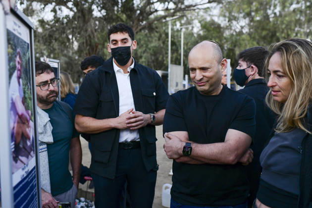 Reim Nova Memorial Marks Anniversary Former Israeli prime minister Naftali Bennett stands with his arms folded before a memorial portrait plaque at the Nova music festival memorial site near Reim, southern Israel, on October 7, 2026. The Hamas-led attack on Israel on October 7, 2023, killed about 1,200 people and saw 251 taken hostage; more than 350 people were killed at the Nova festival. Memorial events marking the third anniversary were held at the site throughout the day. Reim Southern District Israel Copyright: xTomerxNeubergx