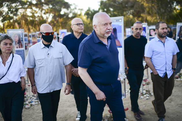 Reim Nova Memorial Marks Anniversary A man in a navy shirt walks with other visitors through the memorial field at the Nova music festival memorial site near Reim, southern Israel, on October 7, 2026. The Hamas-led attack on Israel on October 7, 2023, killed about 1,200 people and saw 251 taken hostage; more than 350 people were killed at the Nova festival. Memorial events marking the third anniversary were held at the site throughout the day. Reim Southern District Israel Copyright: xTomerxNeubergx