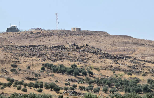 Israeli army conducts raids in Syria s Quneitra countryside QUNEITRA, SYRIA - OCTOBER 8: Israeli forces patrol the village as they conduct raids in residential areas and fire harassment shots at open areas in the countryside of Quneitra, southern Syria, on October 8, 2026. Huseyin Mesal Anadolu Quneitra Syria. Editorial use only. Please get in touch for any other usage.  Copyright: x2026xAnadoluxHuseyinxMesalx