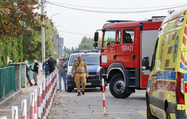 Stabbing attack at a primary school in Poland Photo: Wojciech Olkusnik East News Emergency services are seen at the site after a knife attack at the local primary school on October 8, 2026 in the village of Leszczydol-Nowiny in central Poland, approximately 60 km north-east of Warsaw. A 15-year-old school graduate entered the building armed with a knife and fatally stabbed the janitor and wounded two teachers trying to overpower him. According to the police the perpetrator was wearing a helmet with a camera and planned to record the attack. A day earlier a stabbing attack, where nine people were wounded, occurred in a vocational school in the town of Ostroleka, 50 km north of today s site. EN_01685559_0007 