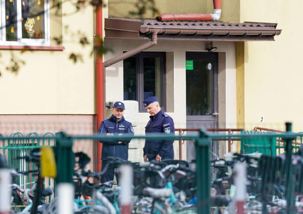 Stabbing attack at a primary school in Poland Photo: Wojciech Olkusnik East News Police officers are seen at the site after a knife attack at the local primary school on October 8, 2026 in the village of Leszczydol-Nowiny in central Poland, approximately 60 km north-east of Warsaw. A 15-year-old school graduate entered the building armed with a knife and fatally stabbed the janitor and wounded two teachers trying to overpower him. According to the police the perpetrator was wearing a helmet with a camera and planned to record the attack. A day earlier a stabbing attack, where nine people were wounded, occurred in a vocational school in the town of Ostroleka, 50 km north of today s site. EN_01685559_0062 