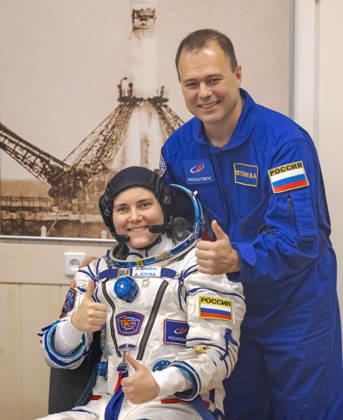 October 8, 2026, Baikonur, Kazakhstan: Baikonur, Kazakhstan. 14 July, 2026. Roscosmos cosmonaut Anna Kikina and backup crew member Dmitry Petelin give a thumbs up before her Sokol suit pressure check at the Baikonur Cosmodrome, July 14, 2026 in Baikonur, Kazakhstan. She launched to the International Space Station later that day. Baikonur Kazakhstan - ZUMAp138 20261008_zaa_p138_046 Copyright: xBillxIngalls Nasax