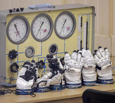 October 8, 2026, Baikonur, Kazakhstan: Baikonur, Kazakhstan. 14 July, 2026. Russian Sokol suit gloves sit beside pressure test equipment inside Building 254 of the Baikonur Cosmodrome before the Expedition 75 launch, July 14, 2026 in Baikonur, Kazakhstan. The crew suited up in the building before launch. Baikonur Kazakhstan - ZUMAp138 20261008_zaa_p138_047 Copyright: xBillxIngalls Nasax