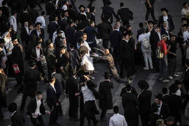 Anti-military service Ultra-Orthodox Jews block road to West Jerusalem JERUSALEM - OCTOBER 8: Ultra-Orthodox Jews, known as Haredi, protest the lack of legislation exempting yeshiva students from mandatory military service and the detention of students on grounds of draft evasion in West Jerusalem, on October 8, 2026. Haredi protesters lie on the road leading to West Jerusalem and block traffic, while Israeli police deployed to the scene intervene against the demonstrators. Mostafa Alkharouf Anadolu Jerusalem Israel. Editorial use only. Please get in touch for any other usage.  Copyright: x2026xAnadoluxMostafaxAlkharoufx