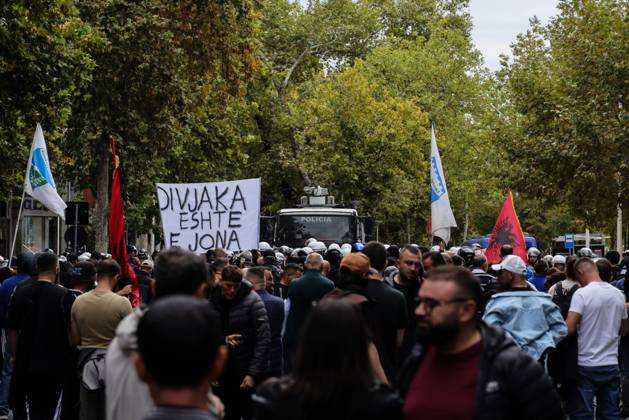 October 8, 2026, Tirane, Albania: TIRANA, ALBANIA †OCTOBER 8, 2026: Citizens, local activists and supporters of the opposition gather outside the Albanian Parliament as lawmakers debate and vote on proposed changes to the countryâ€⠢s administrative-territorial division. The reform proposes reducing the number of municipalities from 61 to 46 through the merger of 15 existing municipalities, including Divjako«, PolioÂßan and Memaliaj. Residents and representatives of municipalities affected by the proposed changes joined the protest, calling for their municipalities to be preserved. Protesters displayed banners and slogans opposing the proposed mergers. Tensions escalated between protesters and police, with reports of eggs and - ZUMAq101 20261008_zna_q101_060 Copyright: xVlasovxSulajx