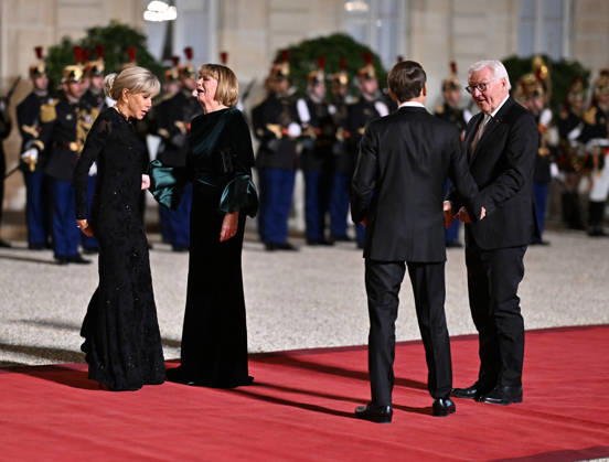 Emmanuel Macron - Frank-Walter Steinmeier meeting in Paris PARIS, FRANCE - OCTOBER 8: French President Emmanuel Macron (2nd R) and French First Lady Brigitte Macron (L) welcome German President Frank-Walter Steinmeier (R) and German First Lady Elke Budenbender (2nd L) for a state dinner at the Elysee Palace in Paris, France on October 8, 2026. Mustafa Yalcin Anadolu Paris France. Editorial use only. Please get in touch for any other usage.  Copyright: x2026xAnadoluxMustafaxYalcinx