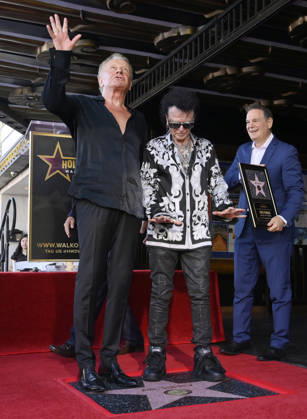 Graham Russell (L) and Russell Hitchcock of the rock duo Air Supply stand on their star during an unveiling ceremony honoring them with the 2,859th star on the Hollywood Walk of Fame in Los Angeles on Thursday October 8, 2026.  LAP2026100805 JIMxRUYMEN