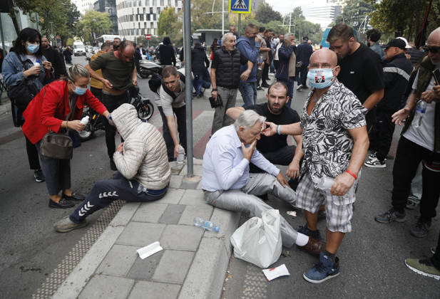 Demonstration Against the Proposed Territorial Reform in Tirana, Albania. Demonstrators clean their eyes after being affected by pepper spray during an anti-government protest against the government s administrative and territorial reform, in front of the Parliament building in Tirana, Albania, on October 8, 2026. Light Studio Agency Malton Dibra Tirana Albania Copyright: xLightxStudioxAgencyx xMaltonxDibrax