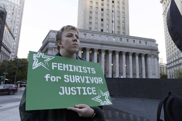 October 8, 2026, New York, New York, USA: A demonstrator holds a sign that reads FEMINISTS FOR SURVIVOR JUSTICE joining hundreds at a rally in Foley Square outside the New York State Supreme Court building in Lower Manhattan under the banner . StopSexualViolence: From the Frat House to the White House. The protest is one of many rallies and campus walkouts around the country demanding justice for Cornell s Jane Doe. New York USA  - ZUMAr174 20261008_znp_r174_029 Copyright: xGinaxMxRandazzox