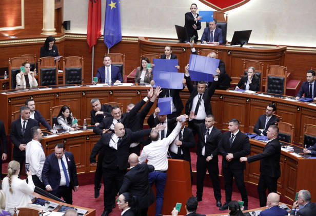 Albanian Parliament Vote the Territorial Reform in Tirana, Albania. Bodyguards try to protect Albanian Prime Minister Edi Rama (C) as an opposition MP throws a water bottle during a parliamentary session where a government s proposed administrative and territorial reform is voted on in Tirana, Albania, early on October 9, 2026. Light Studio Agency Malton Dibra Tirana Albania Copyright: xLightxStudioxAgencyx xMaltonxDibrax