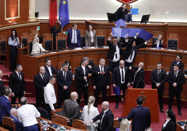 Albanian Parliament Vote the Territorial Reform in Tirana, Albania. Bodyguards try to protect Albanian Prime Minister Edi Rama (C) as an opposition MP throws a water bottle during a parliamentary session where a government s proposed administrative and territorial reform is voted on in Tirana, Albania, early on October 9, 2026. Light Studio Agency Malton Dibra Tirana Albania Copyright: xLightxStudioxAgencyx xMaltonxDibrax
