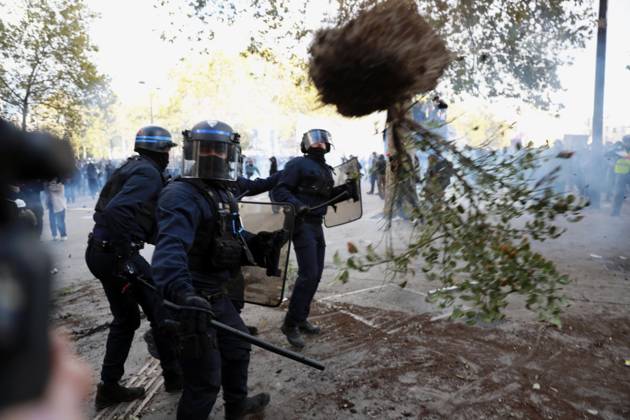Student protests continue in France A potted plant is thrown toward police officers near Place de la Bastille in Paris on Oct. 8, 2026, amid nationwide protests in France demanding more teachers and better facilities.  A14AA0005630499P