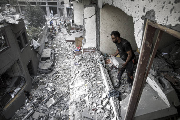 Israeli army continues its attacks on Gaza despite the ceasefire GAZA CITY, PALESTINE - OCTOBER 9: Palestinian civilians and emergency responders search through the debris of damaged residential buildings following an Israeli military airstrike in the Sabra neighborhood, south of Gaza City, Palestine on October 9, 2026. Multiple dead and wounded, including women and children, were reported as rescue teams worked under severe resource shortages to extract survivors from beneath destroyed structures. Saeed M. M. T. Jaras Anadolu Gaza City Gaza. Editorial use only. Please get in touch for any other usage.  Copyright: x2026xAnadoluxSaeedxM.xM.xT.xJarasx