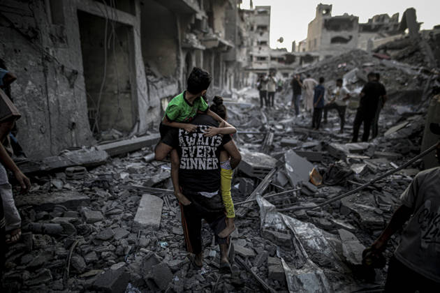Israeli army continues its attacks on Gaza despite the ceasefire GAZA CITY, PALESTINE - OCTOBER 9: Palestinian civilians and emergency responders search through the debris of damaged residential buildings following an Israeli military airstrike in the Sabra neighborhood, south of Gaza City, Palestine on October 9, 2026. Multiple dead and wounded, including women and children, were reported as rescue teams worked under severe resource shortages to extract survivors from beneath destroyed structures. Saeed M. M. T. Jaras Anadolu Gaza City Gaza. Editorial use only. Please get in touch for any other usage.  Copyright: x2026xAnadoluxSaeedxM.xM.xT.xJarasx