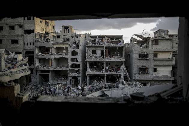 Israeli army continues its attacks on Gaza despite the ceasefire GAZA CITY, PALESTINE - OCTOBER 9: A general view of the destruction as Palestinian civilians and emergency responders search through the debris of damaged residential buildings following an Israeli military airstrike in the Sabra neighborhood, south of Gaza City, Palestine on October 9, 2026. Multiple dead and wounded, including women and children, were reported as rescue teams worked under severe resource shortages to extract survivors from beneath destroyed structures. Saeed M. M. T. Jaras Anadolu Gaza City Gaza. Editorial use only. Please get in touch for any other usage.  Copyright: x2026xAnadoluxSaeedxM.xM.xT.xJarasx