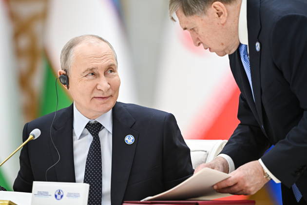 TURKMENISTAN, BALKAN PROVINCE - OCTOBER 9, 2026: Russia s President Vladimir Putin (L) and his adviser Yuri Ushakov attend a narrow-format meeting of the CIS Council of Heads of State in Turkmenbashi Turkmenistan  - ZUMAt113 20261009_zaa_t113_153 Copyright: xSergeixBobylevx