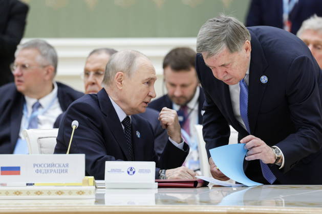 TURKMENISTAN, BALKAN PROVINCE - OCTOBER 9, 2026: Russia s President Vladimir Putin and his aide Yuri Ushaov (L-R front) attend an expanded meeting of the CIS Council of Heads of State in Turkmenbashi Turkmenistan  - ZUMAt113 20261009_zaa_t113_487 Copyright: xGavriilxGrigorovx