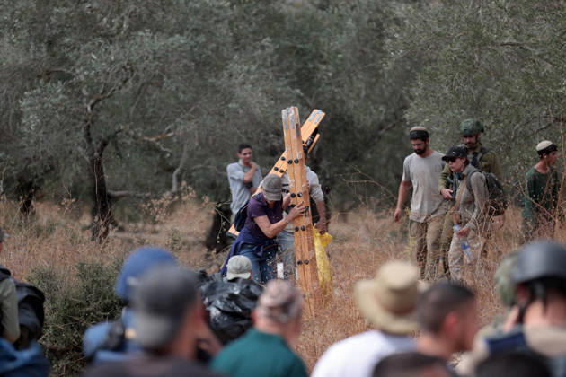 Clashes erupt between Israeli settlers and Palestinian farmers in West Bank RAMALLAH, WEST BANK - OCTOBER 9: Clashes break out between Israeli settlers, accompanied by Israeli soldiers, and Palestinian farmers harvesting olives in the town of Deir Ibzi, near Ramallah in West Bank, on October 9, 2026. The incident reportedly involved damage to olive crops and provocative actions by the settlers. Issam Rimawi Anadolu Ramallah West Bank. Editorial use only. Please get in touch for any other usage.  Copyright: x2026xAnadoluxIssamxRimawix