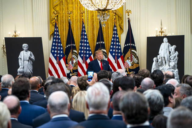 President Donald Trump hosts an event honoring Christopher Columbus in the East Room of the White House in Washington, DC Friday, October 9, 2026. The event highlighted the 13-foot reconstructed statue of Columbus installed outside the Eisenhower Executive Office Building in March after demonstrators in Baltimore threw into the harbor on July 4, 2020.  WAP20261009323 BONNIExCASH