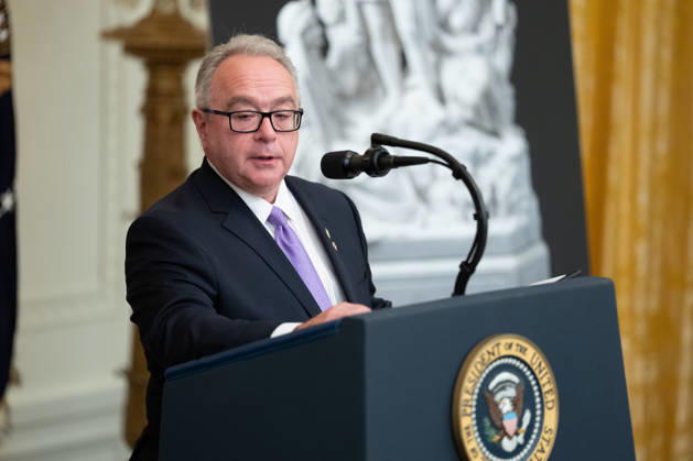 Brett Rugo, founder of Rugo Stone which constructed a helipad on the South Lawn, speaks during an event in the East Room of the White House in Washington, DC on Friday, Oct. 9, 2026. Trump is hosting a Columbus Day celebration.  WASP20261009117 AaronxSchwartz