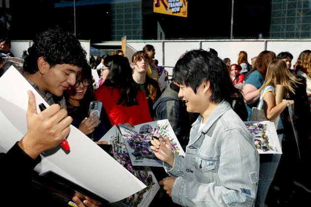 Cast and Fan at signing event at NYCC for The Hunger Games: Sunrise on the Reaping New York Comic Con Activation Featuring: Ben Wang with Fans Where: New York, New York, United States When: 09 Oct 2026 Credit: Marion Curtis StarPix for Lionsgate INSTARimages EDITORIAL USE ONLY. NOT FOR USE BY NEWSPAPERS BASED IN THE UK. Copyright: xx instar56081782
