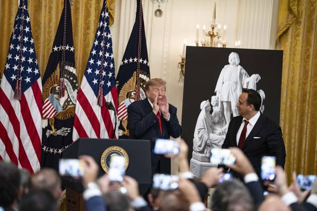 United States President Donald J Trump greets singer Christopher Macchio as he hosts a Columbus Day Celebration in the East Room of the White House in Washington, DC, USA on Friday, October 8, 2026. Copyright: xAaronxSchwartz PoolxviaxCNPx MediaPunchx