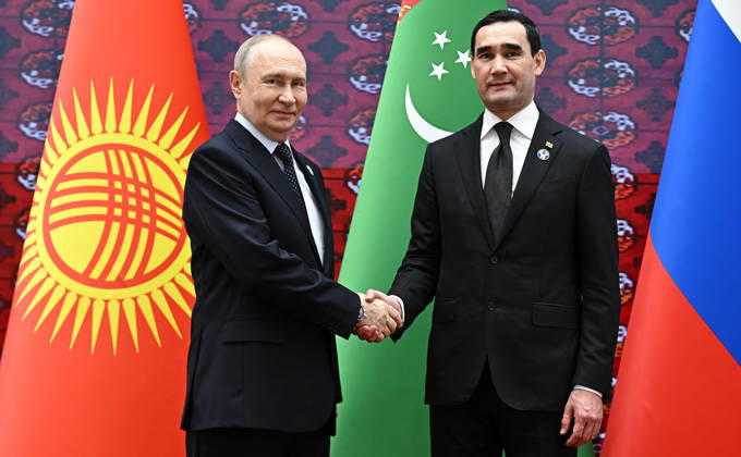 Russian President Vladimir Putin, left, and Turkmenistan s President Serdar Berdymukhamedov shake hands during a welcoming ceremony at the Commonwealth of Independent States (CIS) summit in Turkmenbasy, Turkmenistan, Friday, October 9, 2026.  TUR2026100917 KremlinxPressxOffice