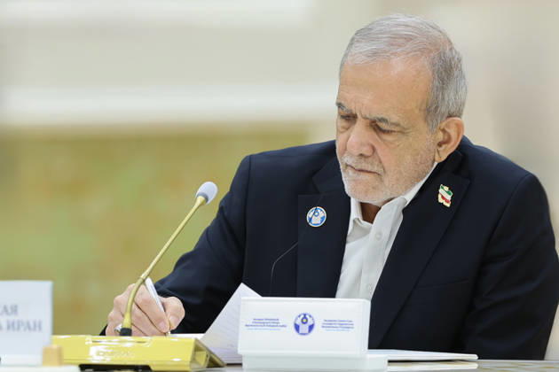 October 9, 2026, Turkmenbashi, Turkmenistan: Iranian President Masoud Pezeshkian writes on a document during the CIS Council of Heads of State meeting in the Avaza National Tourist Zone in Turkmenbashi, Turkmenistan, on October 9, 2026. The meeting, chaired by Turkmen President Serdar Berdimuhamedov, brought together leaders of CIS states and CIS Secretary General Sergey Lebedev, with Pezeshkian participating for the first time as a special guest. In his address, Pezeshkian called for stronger regional connectivity and cooperation in transport, energy and trade. Turkmenbashi Turkmenistan - ZUMAi98_ 20261009_zih_i98_072 Copyright: xIranianxPresidencyx