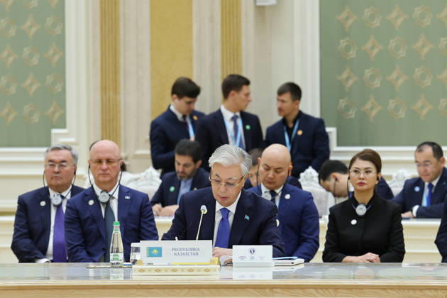 October 9, 2026, Turkmenbashi, Turkmenistan: Kazakh President Kassym-Jomart Tokayev reads from documents behind Kazakhstan s nameplate during the Caspian Environmental Summit in the Avaza National Tourist Zone in Turkmenbashi, Turkmenistan, on October 9, 2026. The first Caspian Environmental Summit, chaired by Turkmen President Serdar Berdimuhamedov, brought together the presidents of Azerbaijan, Iran, Kazakhstan and Russia. The leaders adopted a joint decision aimed at strengthening five-party cooperation on falling Caspian Sea levels, while Pezeshkian called for joint scientific research, data sharing, coordinated action and stronger implementation of the Tehran Convention. Turkmenbashi Turkmenistan - ZUMAi98_ 20261009_zih_i98_076 Copyright: xIranianxPresidencyx
