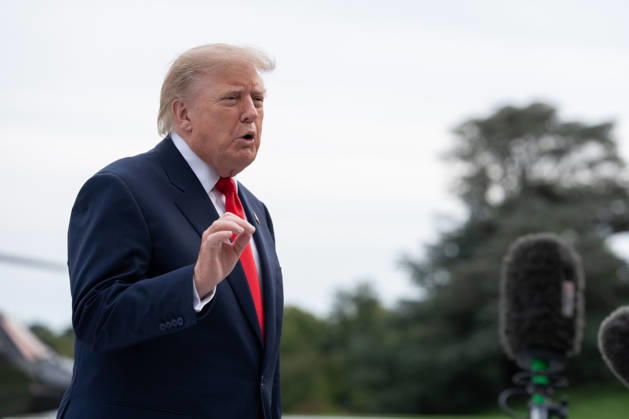 President Donald Trump speaks to members of the media on the South Lawn of the White House before boarding Marine One in Washington, DC on Friday, Oct. 9, 2026. Trump is heading to Syracuse on Friday to boost Republican gubernatorial candidate Bruce Blakeman, who is trailing Governor Kathy Hochul in polls ahead of November s election.  WASP20261009140 AaronxSchwartz