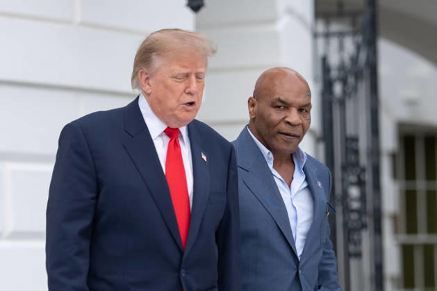 President Donald Trump walks with former professional boxer Mike Tyson on the South Lawn of the White House before boarding Marine One in Washington, DC on Friday, Oct. 9, 2026. Trump is heading to Syracuse on Friday to boost Republican gubernatorial candidate Bruce Blakeman, who is trailing Governor Kathy Hochul in polls ahead of November s election.  WASP20261009141 AaronxSchwartz