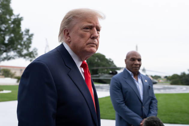 President Donald Trump stands with former professional boxer Mike Tyson while speaking to members of the media on the South Lawn of the White House before boarding Marine One in Washington, DC on Friday, Oct. 9, 2026. Trump is heading to Syracuse on Friday to boost Republican gubernatorial candidate Bruce Blakeman, who is trailing Governor Kathy Hochul in polls ahead of November s election.  WASP20261009150 AaronxSchwartz