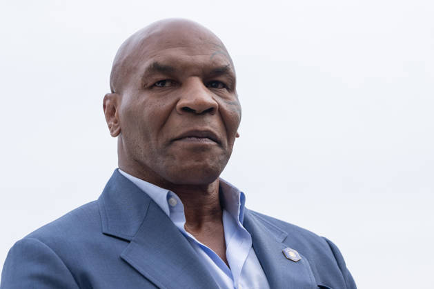 Former professional boxer Mike Tyson stands on the South Lawn of the White House before boarding Marine One in Washington, DC on Friday, Oct. 9, 2026. President Donald Trump is heading to Syracuse on Friday to boost Republican gubernatorial candidate Bruce Blakeman, who is trailing Governor Kathy Hochul in polls ahead of November s election.  WASP20261009154 AaronxSchwartz